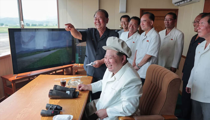 This picture taken on August 24, 2024 and released by North Korea’s official Korean Central News Agency (KCNA) on August 26 shows North Korean leader Kim Jong Un (front C) inspecting a performance test of drones organised by the Drone Institute of the Academy of Defence Sciences at an undisclosed location in North Korea. — AFP