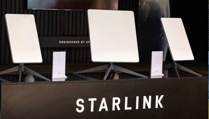 A representational image showing Starlink logo at the companys stall during an exhibition. — AFP/File