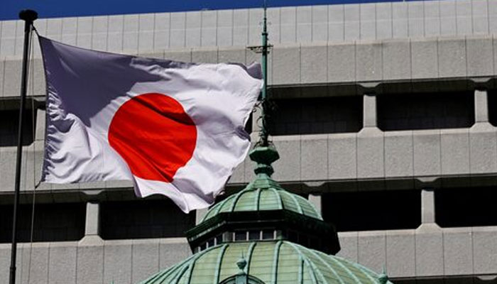 The Japanese national flag waves at the Bank of Japan building in Tokyo, Japan March 18, 2024. — Reuters