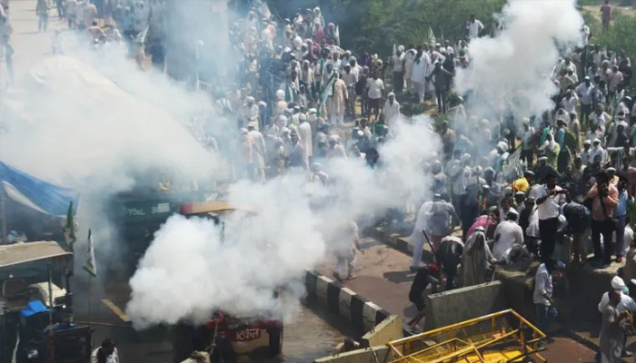 Farmers blocked one of the highways into New Delhi and used tractors to try and break through a police barrier. — AFP/file