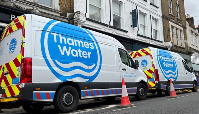 Thames Water vans are parked on a road as repair and maintenance work takes place, in London, Britain, on April 3, 2024. — Reuters