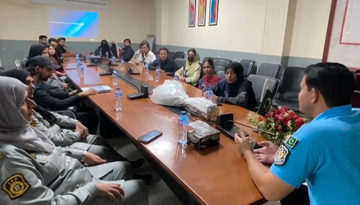 Islamabad SP Saddar Zone Khan Zeb Police Operations Division is expressing his views to the students of Iqra University in his office on August 28, 2024. — Screengrab/Facebook/@islamabadpolice