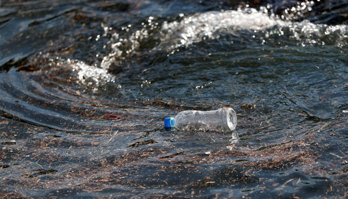 A plastic bottle drifts on the waves of the sea at a fishing port in Isumi, east of Tokyo, Japan, November 21, 2018. — Reuters