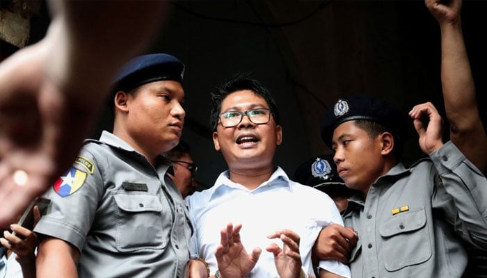 Reuters journalist Wa Lone departs Insein court after his verdict announcement in Yangon, Myanmar, September 3, 2018. — Reuters