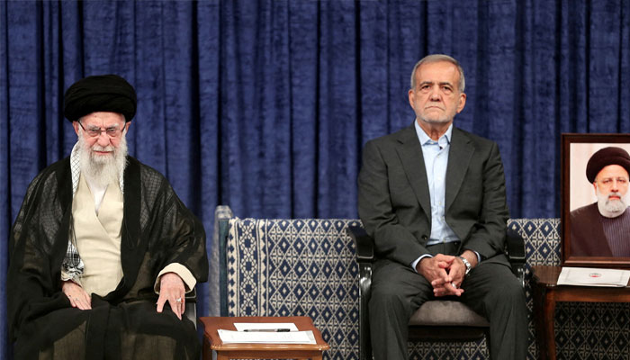 Irans Supreme Leader Ayatollah Ali Khamenei and Irans new president, Masoud Pezeshkian, attend an endorsement ceremony in Tehran, Iran, July 28, 2024. — Reuters