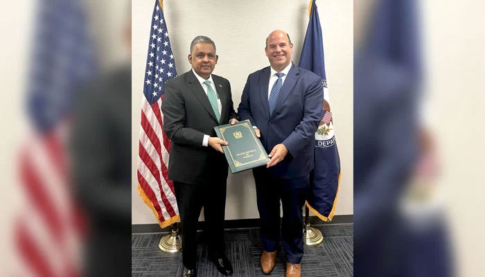 Pakistans Ambassador to US Rizwan Saeed Sheikh (right) presents his credentials at Department of State. — @Facebook/Pakistan Embassy US