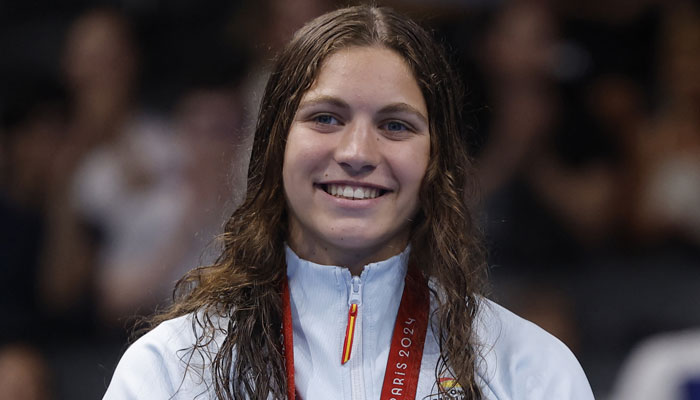 Paralympic gold medallist Anastasiya Dmytriv of Spain celebrates after winning the final of Womens 100m breaststroke. — Reuters