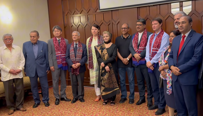 Sindh Local Government Minister Saeed Ghani poses for a group ophoto along with envoys of other countries during the inauguration ceremony of the cultural exhibition held at a local hotel in Karachi on August 31, 2024. — Screengrab/Facebook/@SaeedGhaniPPP