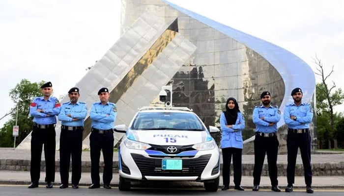 Islamabad Capital City Police Officers pose on the road of ICT on January 27, 2024. — Facebook/@islamabadpolice