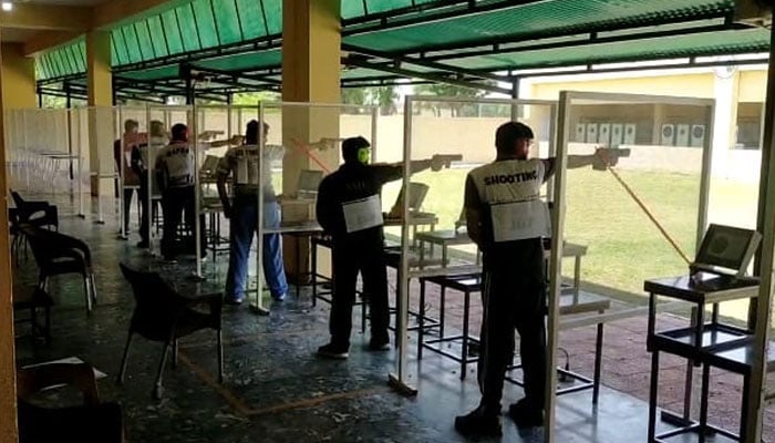 This representative image shows the players shooting their targets. — APP/File