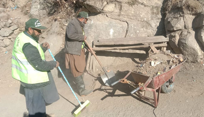 A representational image showing local government workers seen busy in cleaning drive. — Facebook/@dglgrd/File