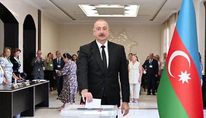 Azeri President Ilham Aliyev casts a ballot at a polling station during parliamentary elections in Baku, Azerbaijan September 1, 2024. — Reuters