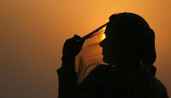 A file photo showing silhouette of a woman. — Reuters/file