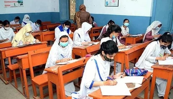 Students attempting an exam in a classroom in this undated photo. — APP/File