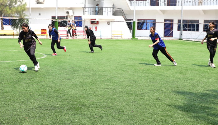 Iqra University (IU) H-9 Campus Islamabad of Students are playing football in the Inter-College Sports Festival on September 1, 2024. — Facebook/@IUIsbCampus