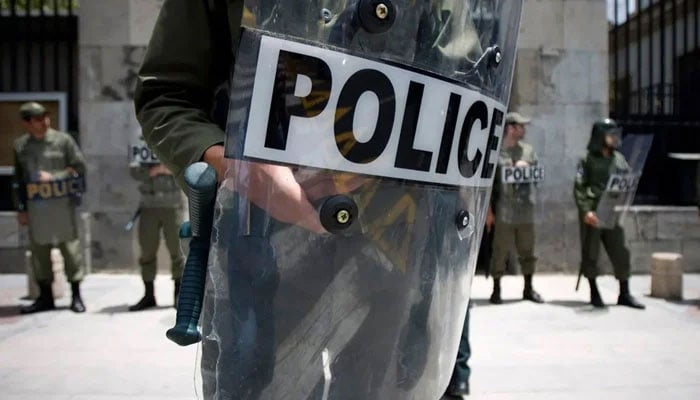 A representational image of Iranian police personnel standing guard in Tehran, Iran. — Reuters/File