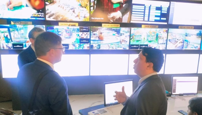 CEO Water Corporation Engineer Syed Salahuddin is briefing the delegation of European Union and European Investment Bank regarding Hydrant Management Center Water Corporation by showing them on the screens seen in this image released on September 3, 2024. — Facebook/@KWSCOFFICIAL