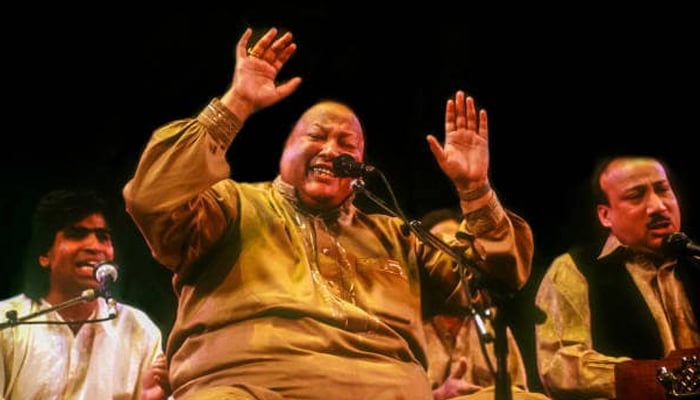 Music legend Nusrat Fateh Ali Khan (late) seen during a performance in this undated image. — Facebook/@theofficialnusrat/File