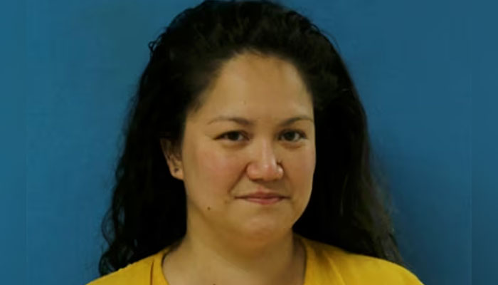 Elizabeth Wolf, accused of the attempted drowning of a 3-year-old girl, poses for an undated police booking photograph in the Dallas suburb of Euless, Texas, U.S. — Reuters/File