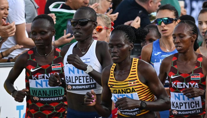 Ugandas Rebecca Cheptege (2nd right).— AFP/file