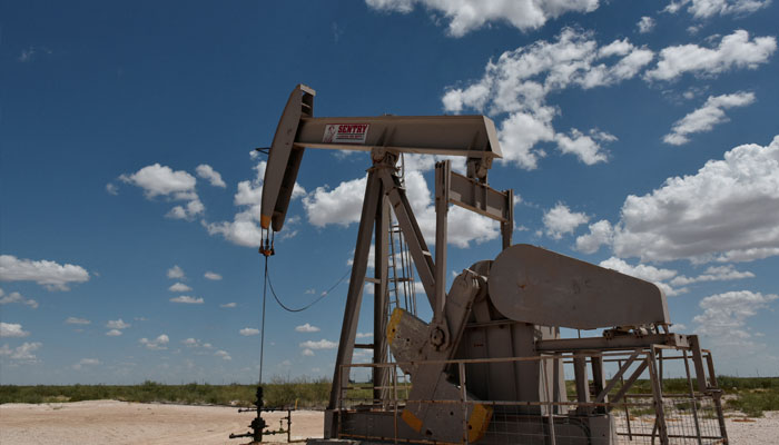 A pump jack operates in the Permian Basin oil production area near Wink, Texas US August 22, 2018. Picture taken August 22, 2018. — Reuters