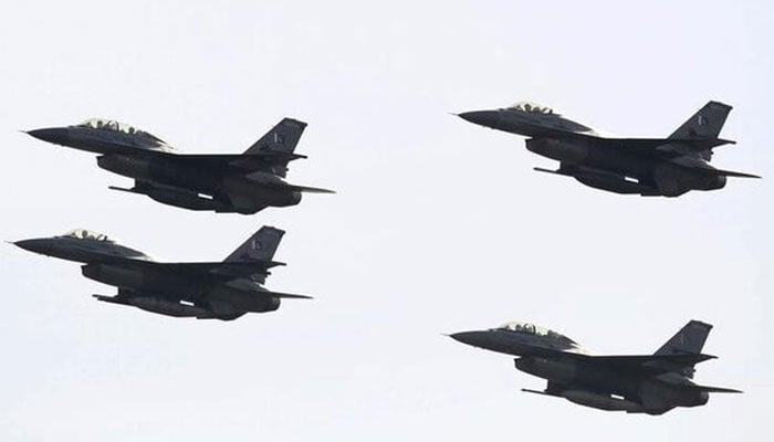 PAFs F-16 fighter jets fly past during the Pakistan Day military parade in Islamabad. — Reuters/File