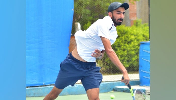 A player takes a shot during the semifinal of the 36th Federal Cup National Ranking Tennis Championships at PTF-SDA Complex on January 5, 2024. — Facebook/Pakistan Tennis Federation