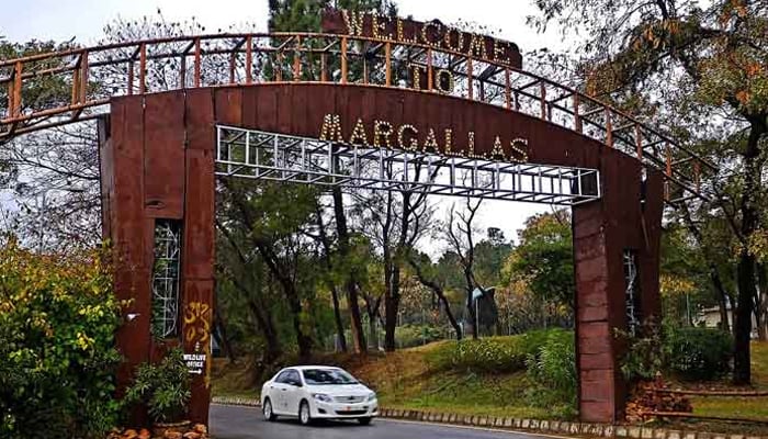 A car can be seen entering in the Margallah Hills National Park. — APP/File