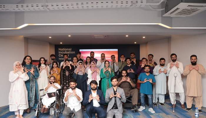 Participants pose for a group photo after attending an orientation session organised by DeafTawk on September 6, 2024. — Facebook/@ICFInnovation