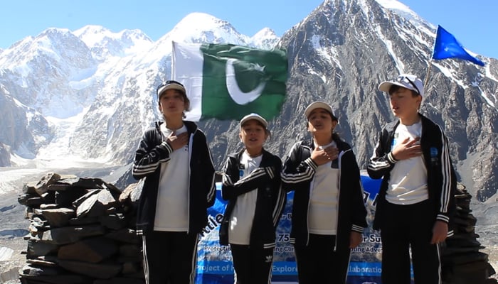 Organized by Hindukush Explorers 4 children are visiting the Basecamp of Terich Mir Raheel Danial (1st from right), Anobiya Irfan (2nd from right), Anush Alam and Anum Khadim are singing the National Anthem of Pakistan September 6, 2024. — Screengrab/Facebook/@hindukushexplorers