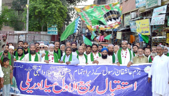 Zahid Bilal Qureshi (6th from left), Qari Ejaz Attari, Qari Mohammad Amin Qadri and others pose for a photo during a rally in relation to Eid Milad un Nabi (PBUH) on September 6, 2024. — Facebook/@zahidbilal.qureshi