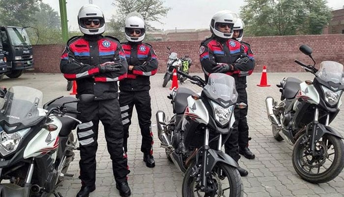 Dolphin Force personnel pose for a photo in this undated image. — Facebook/Dolphin Police/File