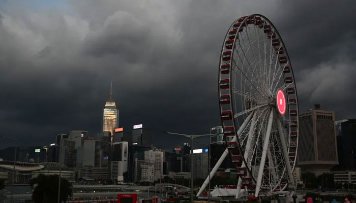 Storm clouds gather over buildings in Hong Kong as Super Typhoon Yagi tracked across the South China Sea towards the southern China coast. — AFP/File