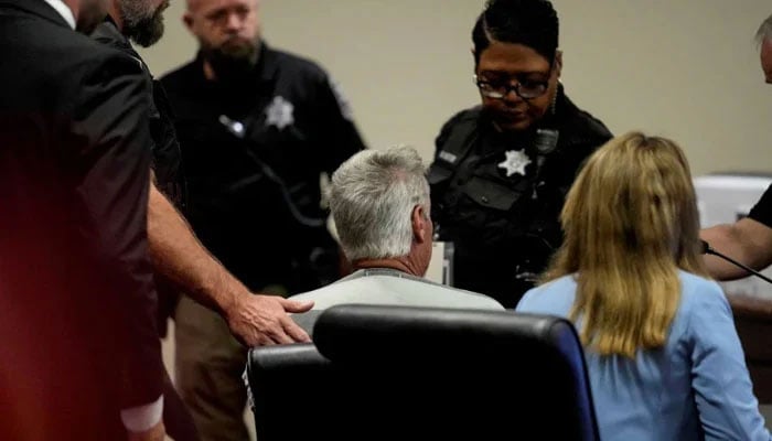 Colin Gray (left), 54, the father of Apalachee High School shooter Colt Gray, 14, who is charged as an adult with four counts of murder , sits in the Barrow County courthouse for his first appearance, in Winder, US on Friday. — Reuters