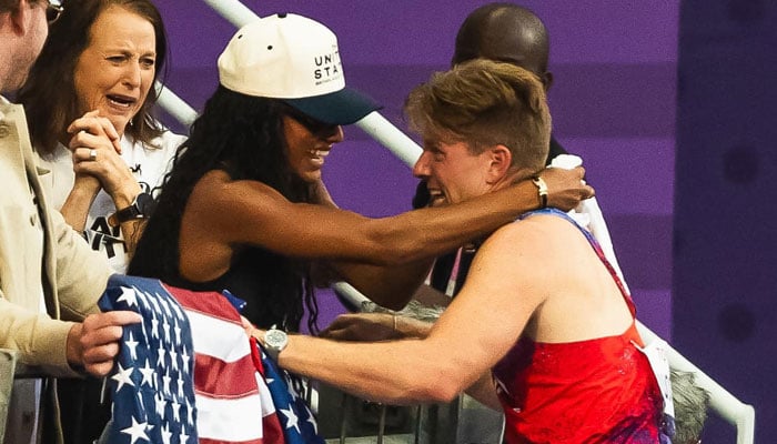 Hunter Woodhall and his wife Olympic womens long jump champion Tara Davis-Woodhall. —Facebook/ Team USA