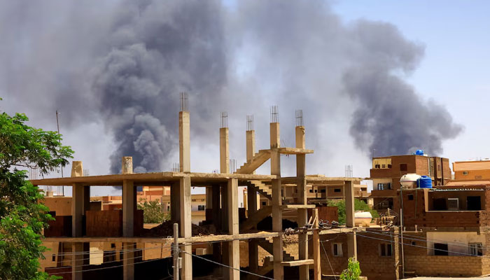 Smoke rises above buildings after an aerial bombardment, during clashes between the paramilitary Rapid Support Forces and the army in Khartoum North, Sudan on May 1, 2023. — Reuters