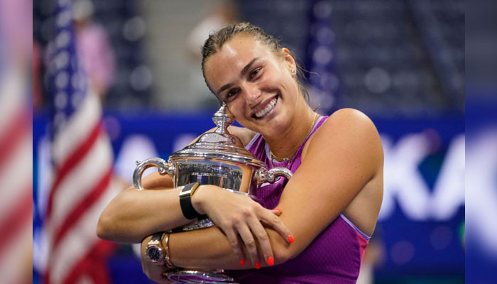 Belaruss Aryna Sabalenka holds the trophy after defeating USAs Jessica Pegula during their womens final match on day thirteen of the US Open tennis tournament in New York City, on September 7, 2024. — AFP