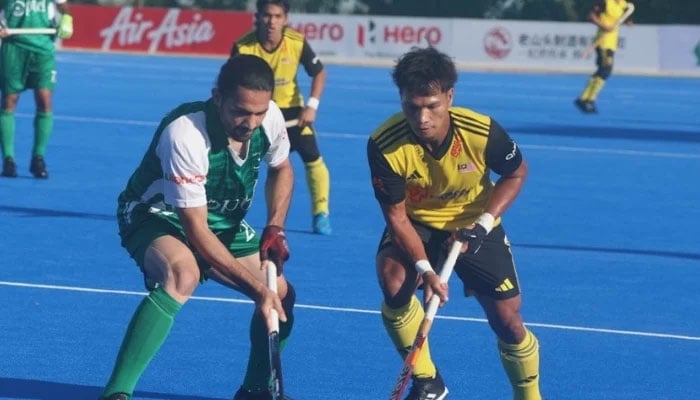 An image showing Pakistan and Malaysian hockey players during their Asian Hockey Champions Trophy match in Hulunbuir City, Inner Mongolia (China). — Facebook/@asiahockey/File