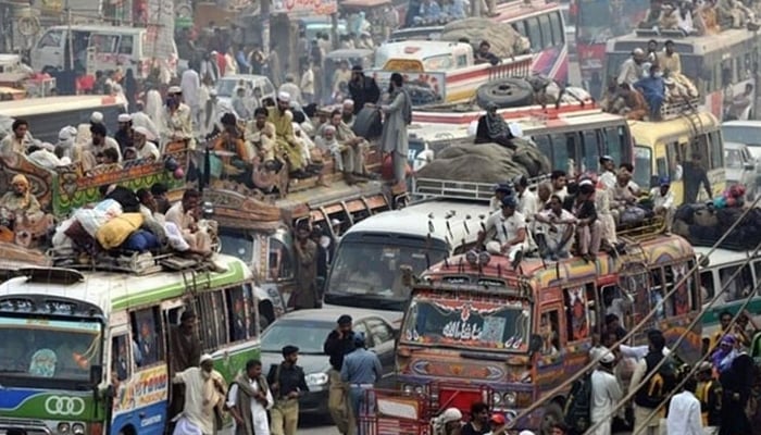 This representational image shows buses and other public transport vehicles filled with passengers. — AFP/File