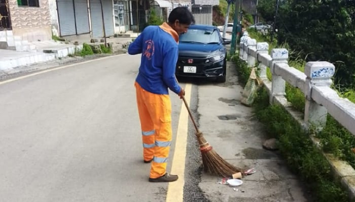 A sweeper works in this image released on September 8, 2024. — Facebook/@www.rwmc.org.pk