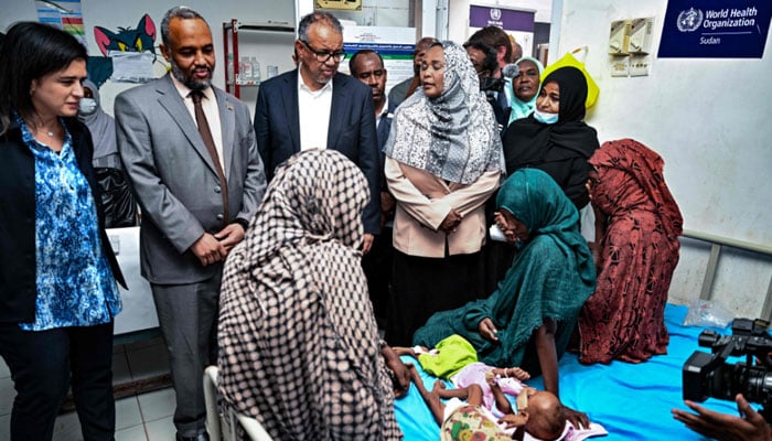 Director-General of the World Health Organization (WHO) Tedros Adhanom Ghebreyesus (C), accompanied by the organisations Middle East Hanan Balkhy (L) visits a childrens hospital in Port Sudan on September 7, 2024. — AFP