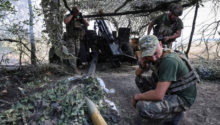 Ukrainian artillerymen fire an M101A1 howitzer towards Russian troops near Pokrovsk, in Ukraines Donetsk region, on September 5, 2024. — Reuters