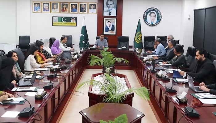 Director General BISP (NSER/CCT) Naveed Akbar talks with BISP officials are seen in this image released on September 9, 2024. — Screengrab/Facebook@NaveedAkbarBISP