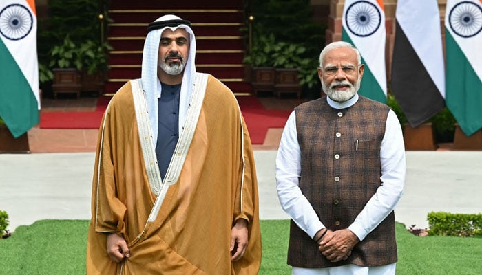 Abu Dhabis Crown Prince Sheikh Khaled bin Mohamed bin Zayed Al Nahyan (L) and Indias Prime Minister Narendra Modi pose before their meeting at the Hyderabad House in New Delhi on September 9, 2024. — AFP