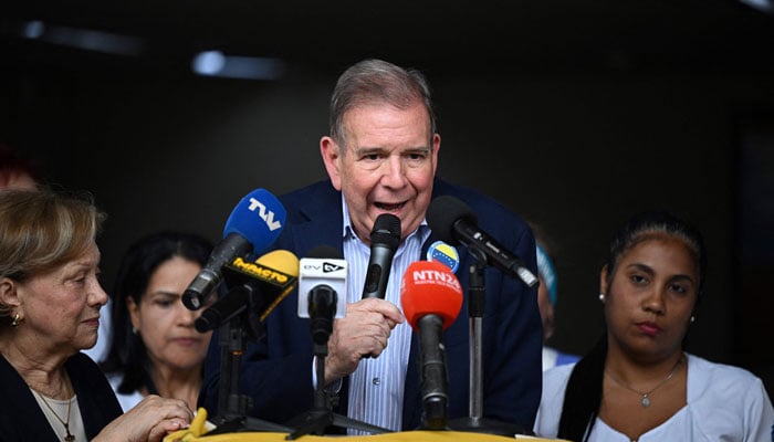 Venezuelan opposition figure Edmundo Gonzalez Urrutia speaks with the press during a meeting with health workers in Caracas on June 18, 2024. — AFP