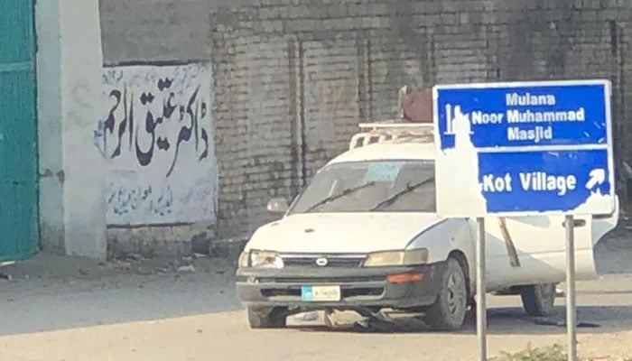 A view of the attacked vehicle in South Waziristan. — Photo by reporter/File