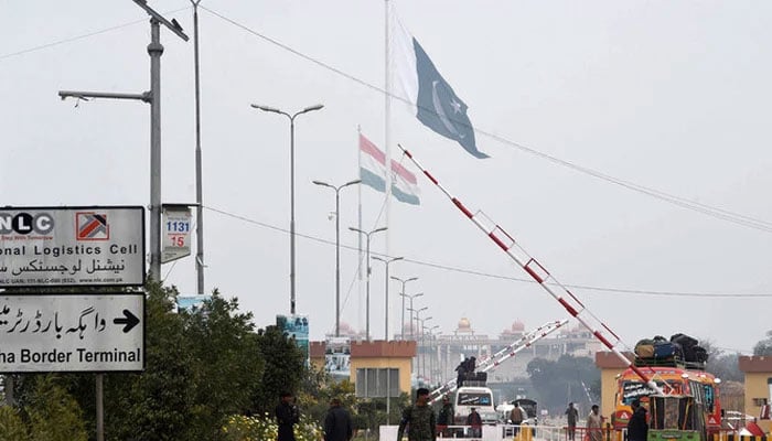 Pakistani paramilitary soldiers walk at a check post near the India and Pakistan border on the Pakistani side of the Wagah border. — AFP/File