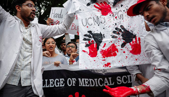 Doctors shout slogans during a protest demanding justice following the rape and murder of a trainee medic at a hospital in Kolkata, in New Delhi, India, on August 19, 2024. — Reuters