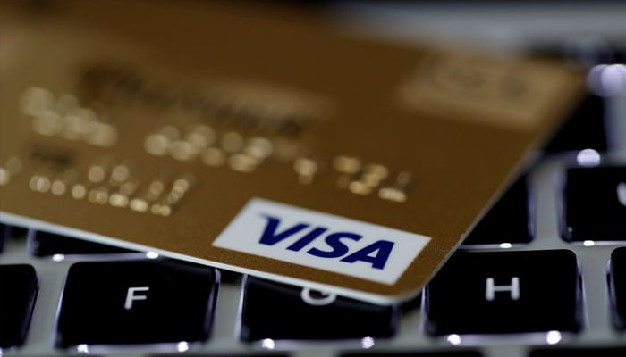 A Visa credit card is seen on a computer keyboard in this picture illustration taken September 6, 2017. —Reuters