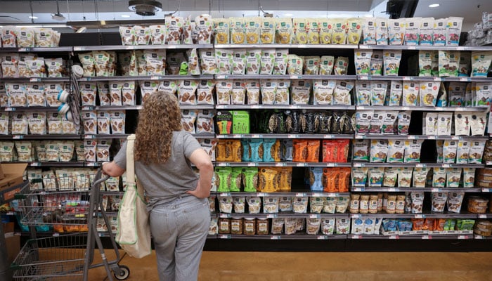 A person shops in a supermarket as inflation affected consumer prices in Manhattan, New York City, US, June 10, 2022. — Reuters